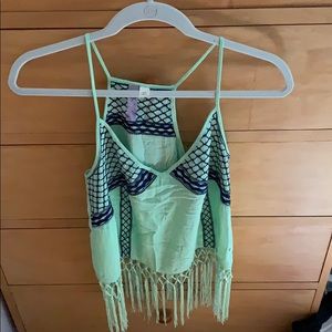 Mint razorback top with tassels